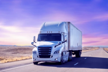 a truck that is driving down the road